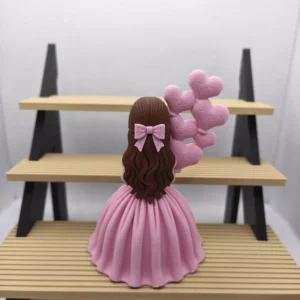 Dievčatko s balonami na predok torty